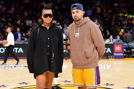 Naomi Osaka and Nick Kyrgios at a Lakers basketball game.