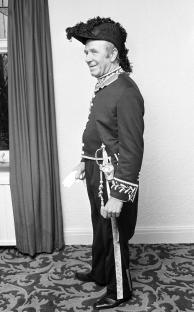 Matt Busby, invested with a knighthood.