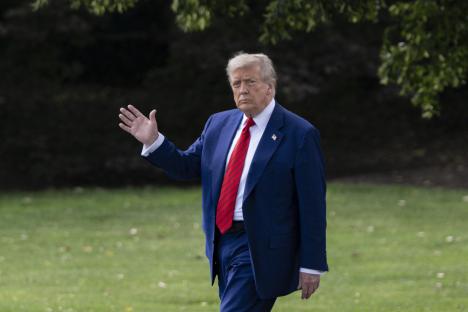 President Donald Trump waving goodbye.