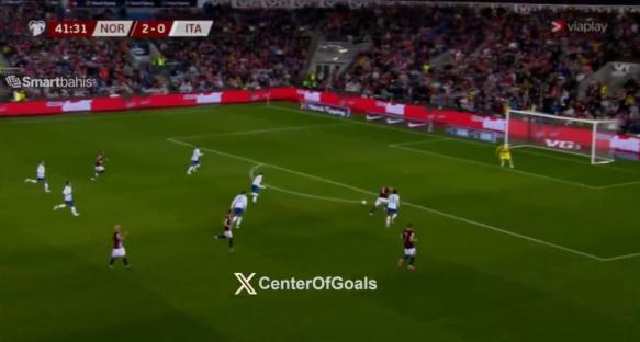 Odegaard assist during a Norway vs. Italy soccer match.