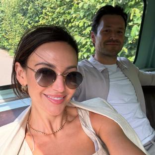 Michelle Keegan and Mark Wright in a vehicle.