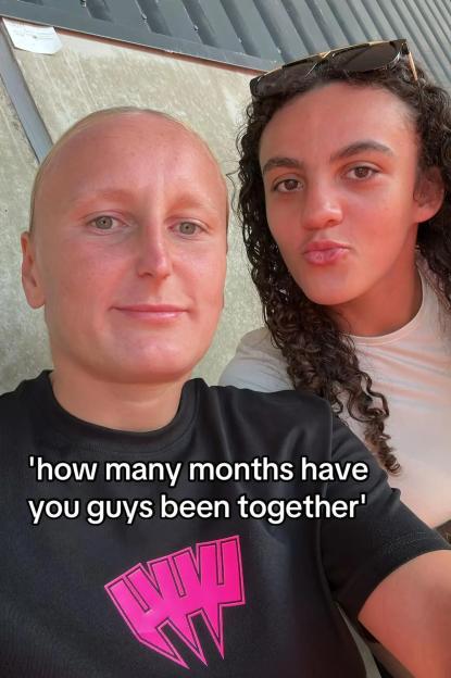Two women posing for a selfie; text overlay asks,