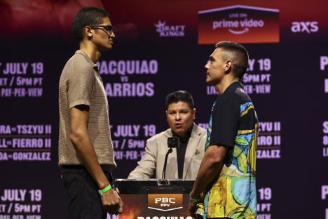 Sebastian Fundora and Tim Tszyu posing at a press conference.