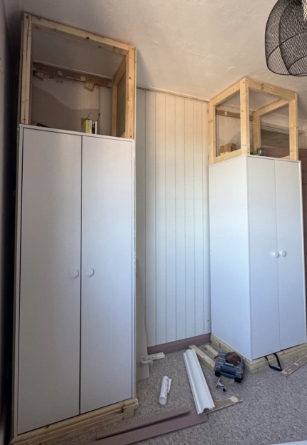 DIY wardrobe installation in progress.