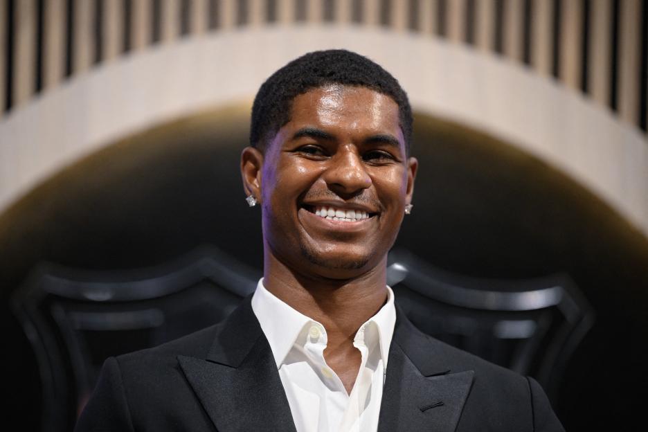 Marcus Rashford smiling at his official Barcelona presentation.