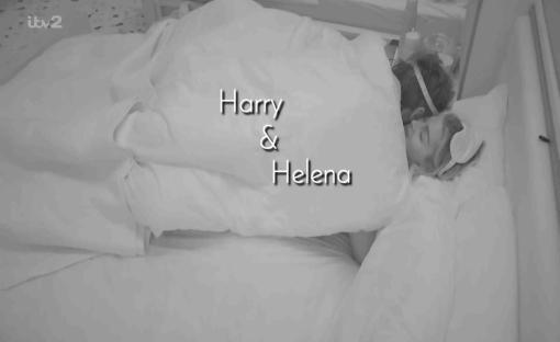 Harry and Helena under covers in bed.