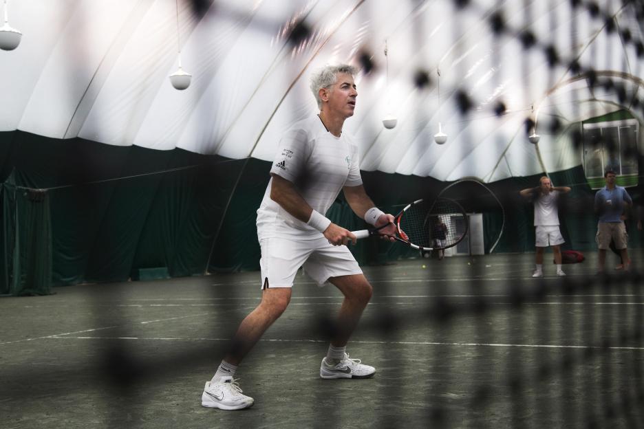 Bill Ackman playing tennis at a Wall Street tournament.