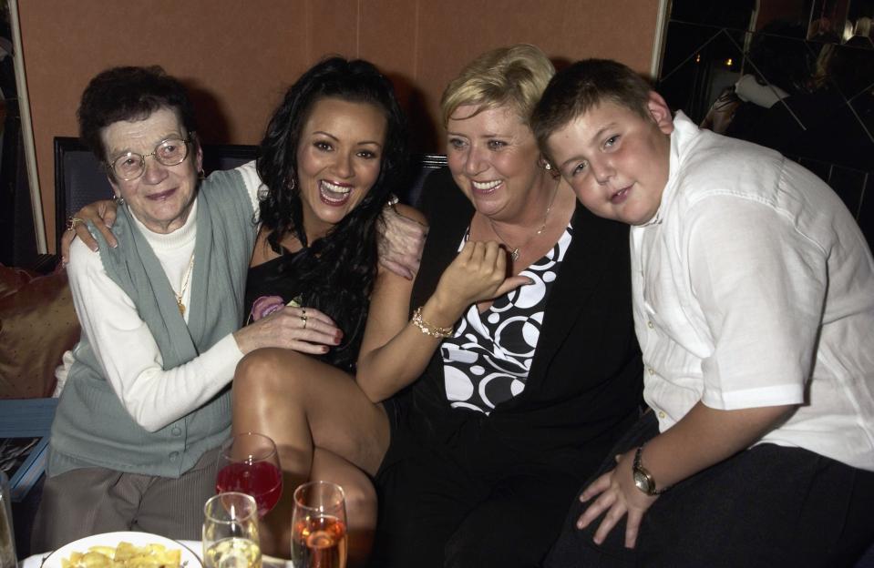 Martine McCutcheon with her grandmother, mother, and brother at a book launch.