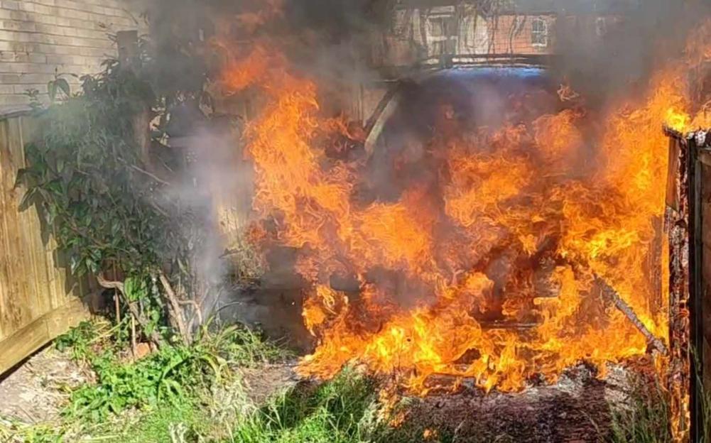 Land Rover engulfed in flames.