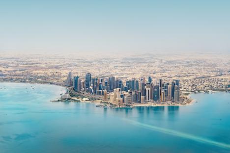 Aerial view of Doha, Qatar's West Bay skyscrapers.
