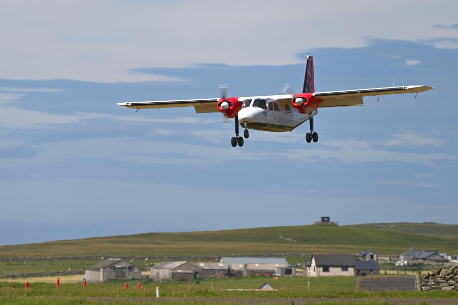 Logan Air plane landing.