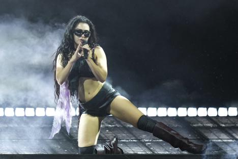 Charli XCX performing at Glastonbury Festival.