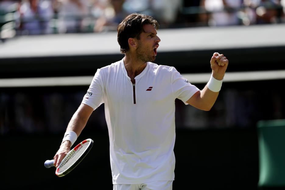 Cameron Norrie of Great Britain celebrates during a tennis match.