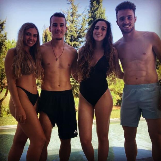 Diogo Jota with his brother and two friends by a pool.