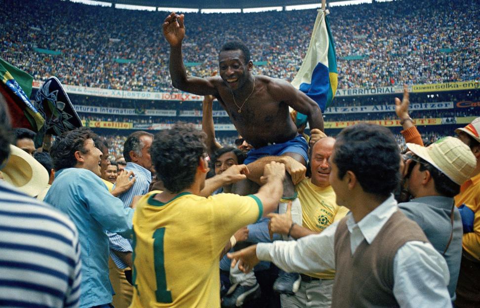 Pelé celebrates Brazil's 1970 World Cup victory in Mexico.