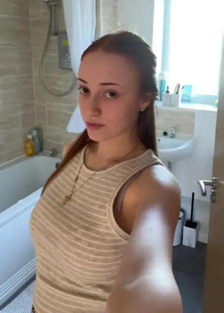 Teenage mother in bathroom asking for help funding a caravan holiday.