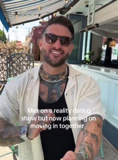 Man announcing he and his partner are moving in together after meeting on a reality dating show.