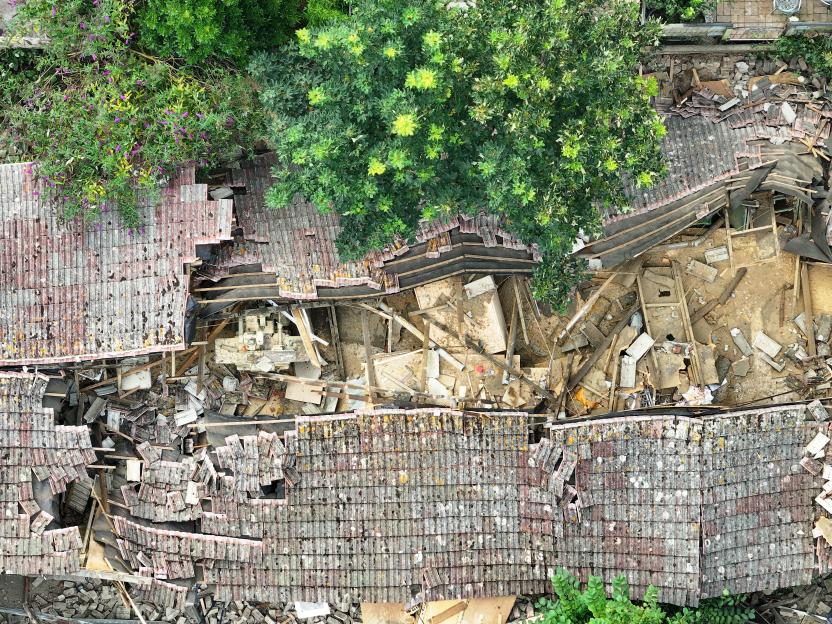 Aerial view of a collapsed building.
