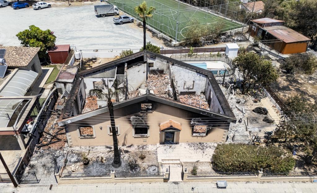 INFERNOS AFTERMATH Moment horrified Brit expats tour smouldering shell of Cyprus home they fled with secs to spare as deadly wildfires hit