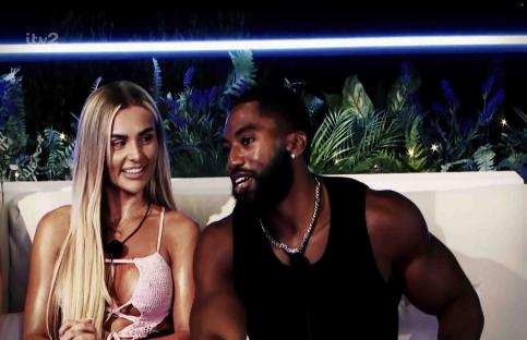 Poppy and Remell from Love Island playing games.