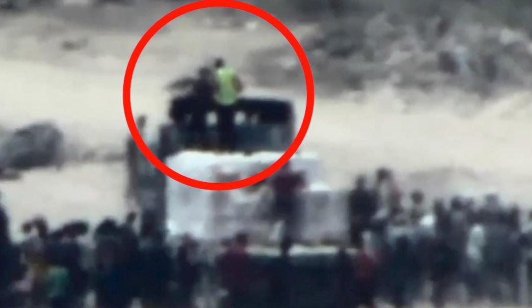 Footage of armed Hamas operatives looting a humanitarian aid truck in Gaza.