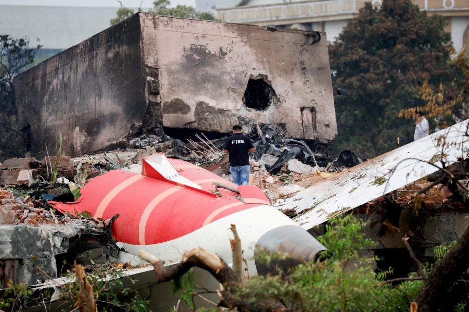 Firefighter at crashed Air India Boeing 787-8 Dreamliner.
