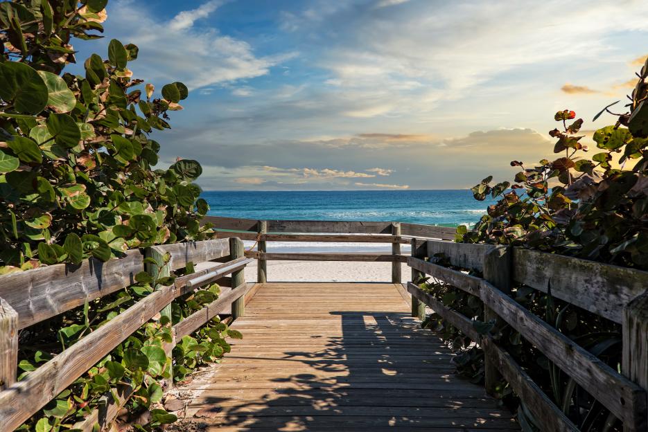 Wooden boardwalk leading to a beach in Melbourne, Florida.