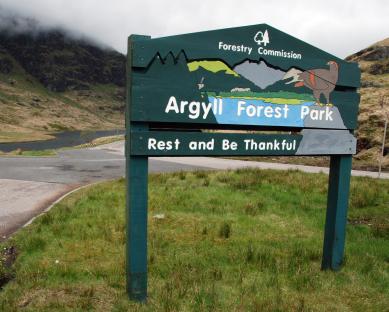 Argyll Forest Park sign: Rest and Be Thankful.
