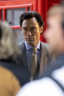 Alex Hassell filming a scene for Rivals season 2.