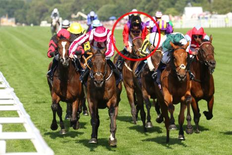 Horse race in progress.