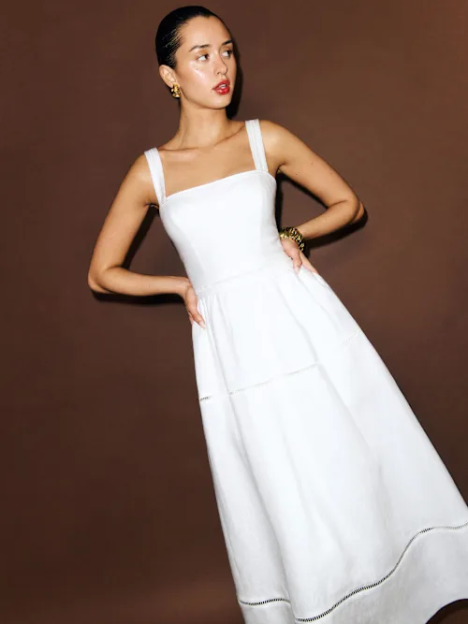 Woman in a white sundress.