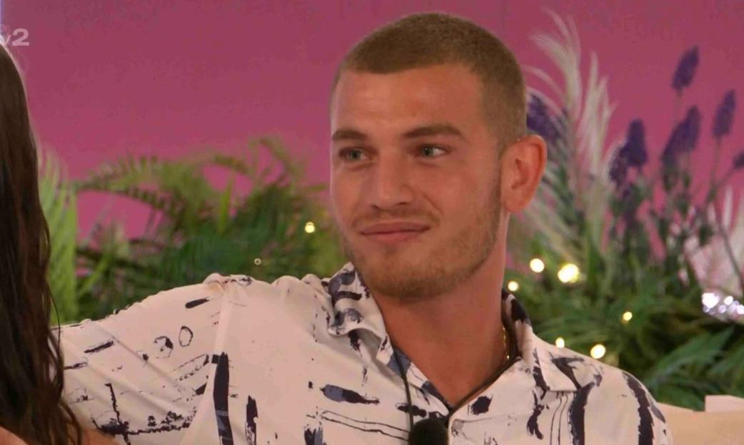Man smiling on Love Island.