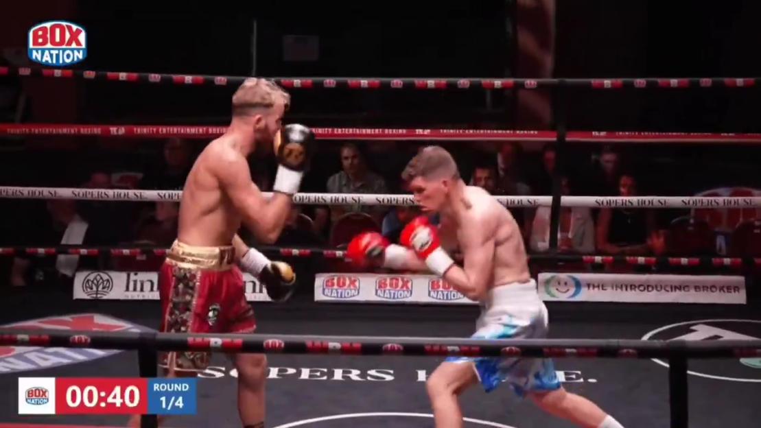 Boxer Kristaps Zulgis knocks down Walter Fury in round one.