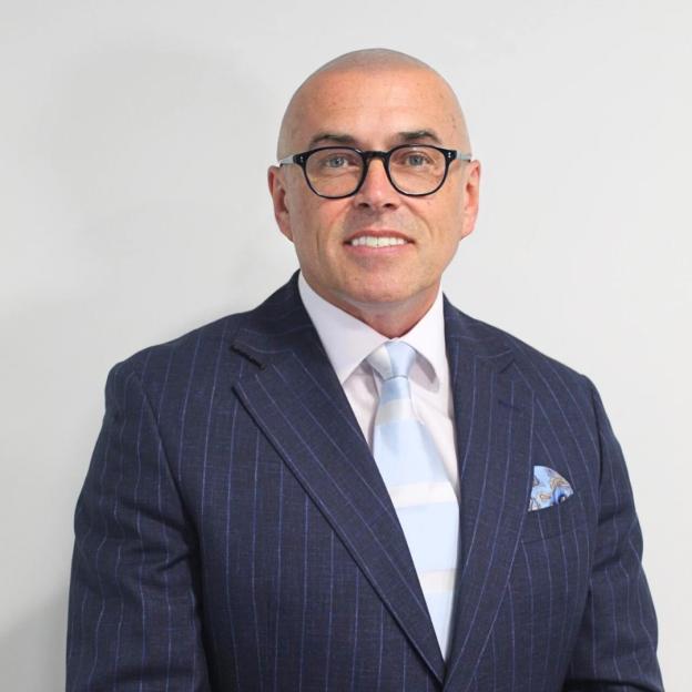 Portrait of Marcus Johnstone, legal expert.