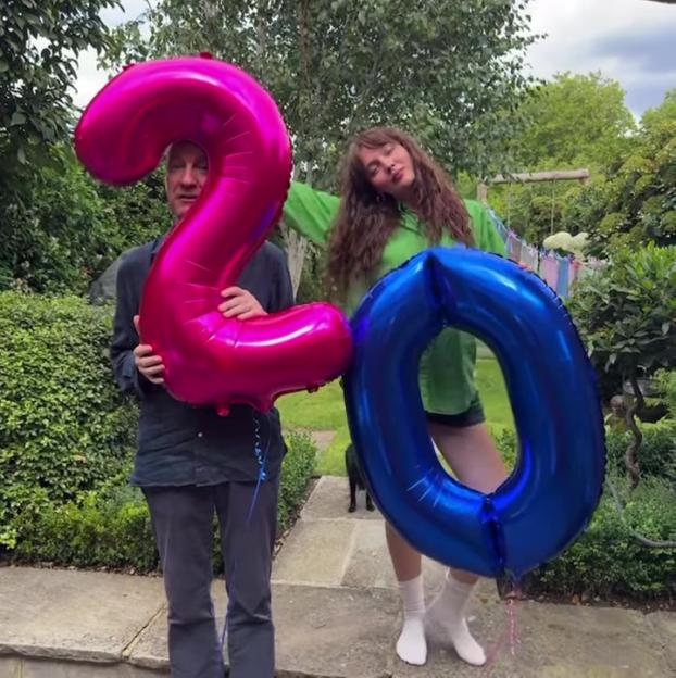 Anna Friel and David Thewlis with their daughter and number 20 balloons.