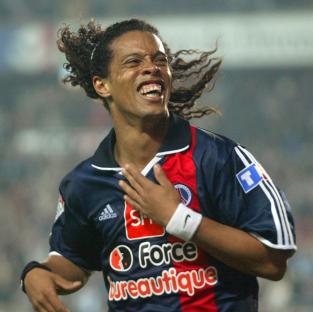 Ronaldinho jubilates after scoring a goal.