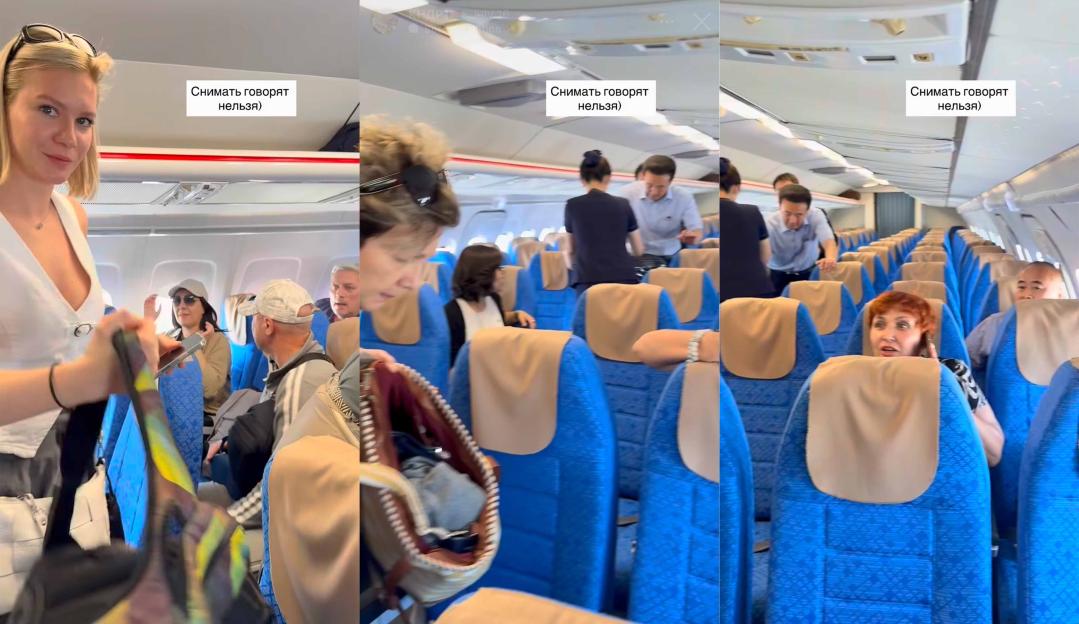 Russian tourists on a plane in North Korea; filming is prohibited.