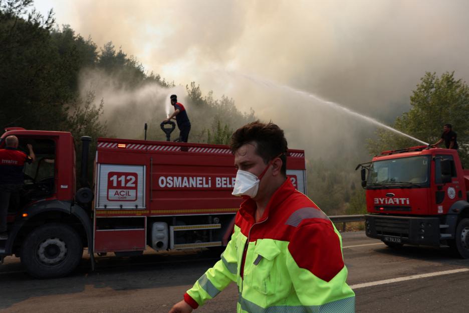 Firefighters battling a wildfire in Turkey.