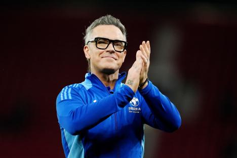 Robbie Williams applauding at Soccer Aid for UNICEF.
