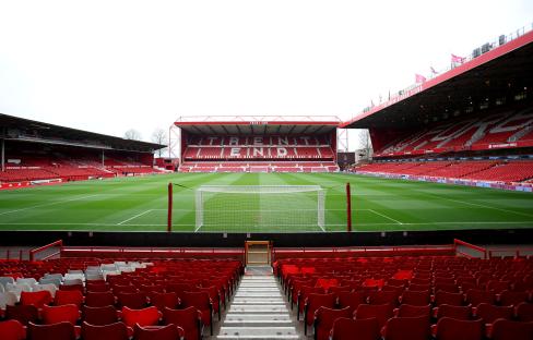 Empty soccer stadium before a match.