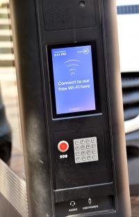Public Wi-Fi kiosk with keypad and USB charging port.