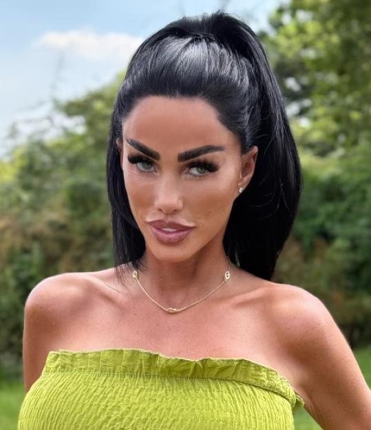 Katie Price in a green top.