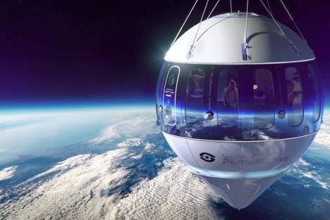 Illustration of a Space Perspective Neptune spaceship capsule above Earth.