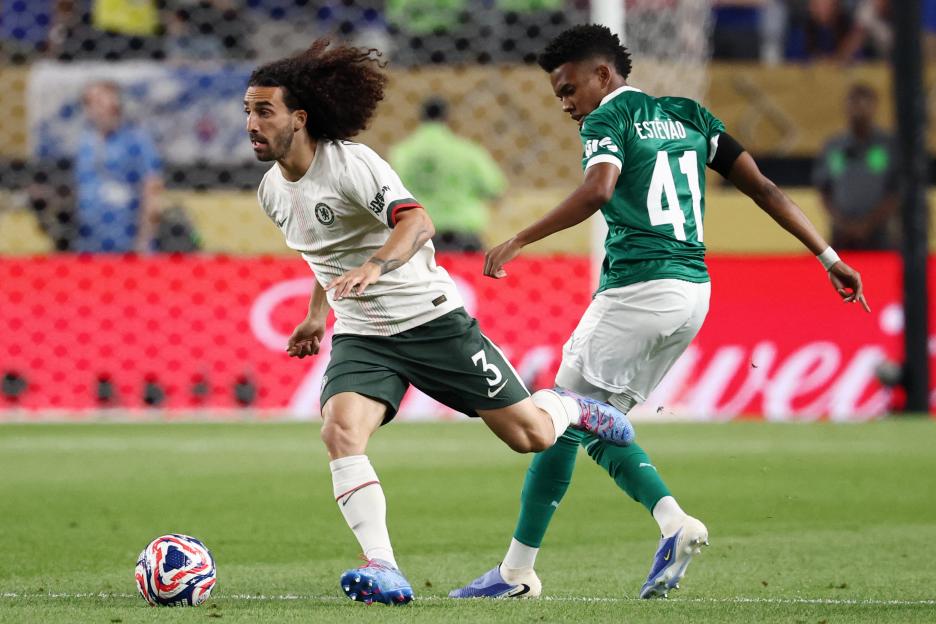 Marc Cucurella and Estevao Willian vying for the ball during a soccer match.