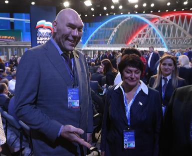 Nikolay Valuev and another person at the 21st Congress of the United Russia Party.