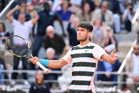 PARIS, FRANCE - JUNE 8: Carlos Alcaraz of Spain reacts as he plays against Jannik Sinner of Italy during the Men's Single Final match on the day 15 of French Open tennis tournament on Court Philippe-Chatrier at the Roland-Garros Complex in Paris, France on June 8, 2025. (Photo by Mustafa Yalcin/Anadolu via Getty Images)