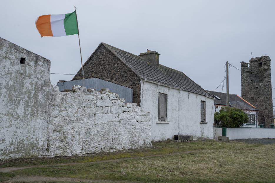Abandoned house with Irish flag on Tory Island.