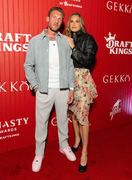 Georgios Frangulis and Aryna Sabalenka at a DraftKings event.