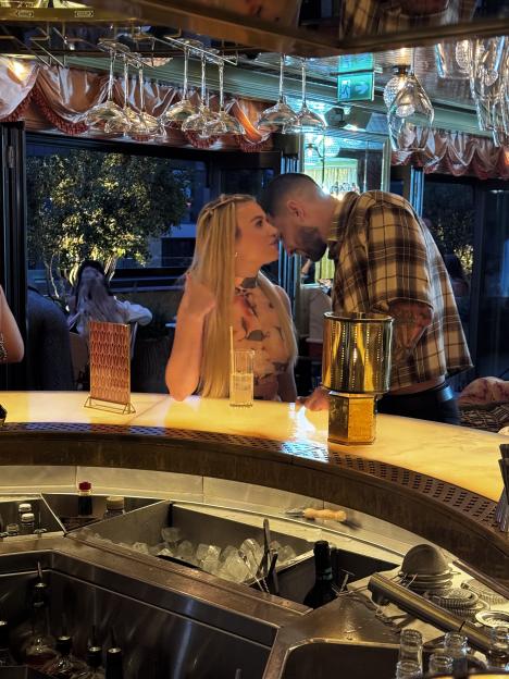 Shea from Love Island and Sacha from Married at First Sight getting close at a bar.