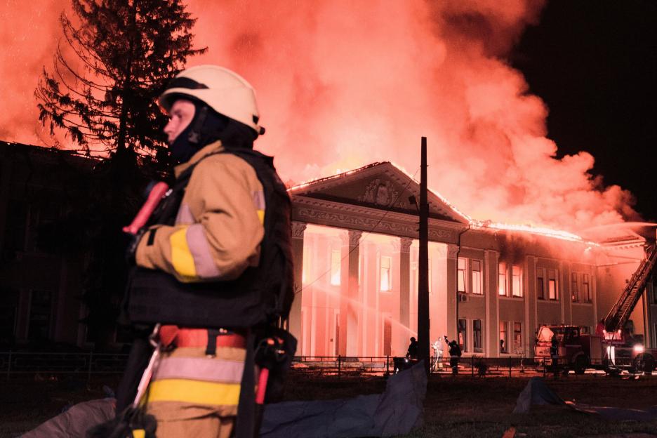Firefighters battling a fire at a building in Kharkiv, Ukraine.